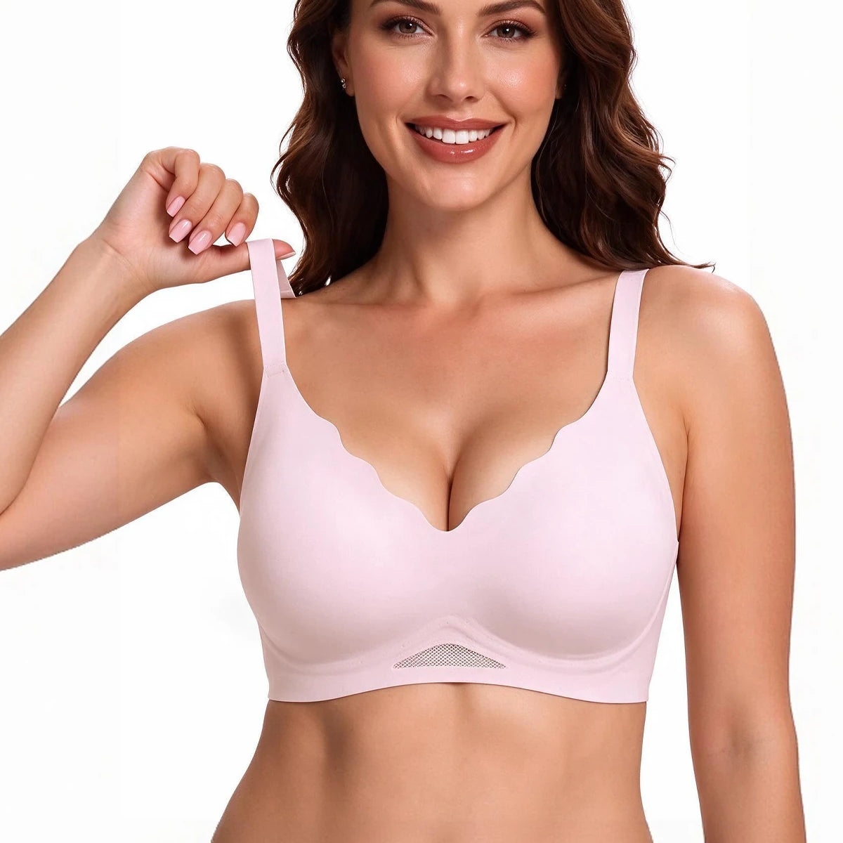 Pink seamless bra with scalloped neckline, molded cups, and wide straps