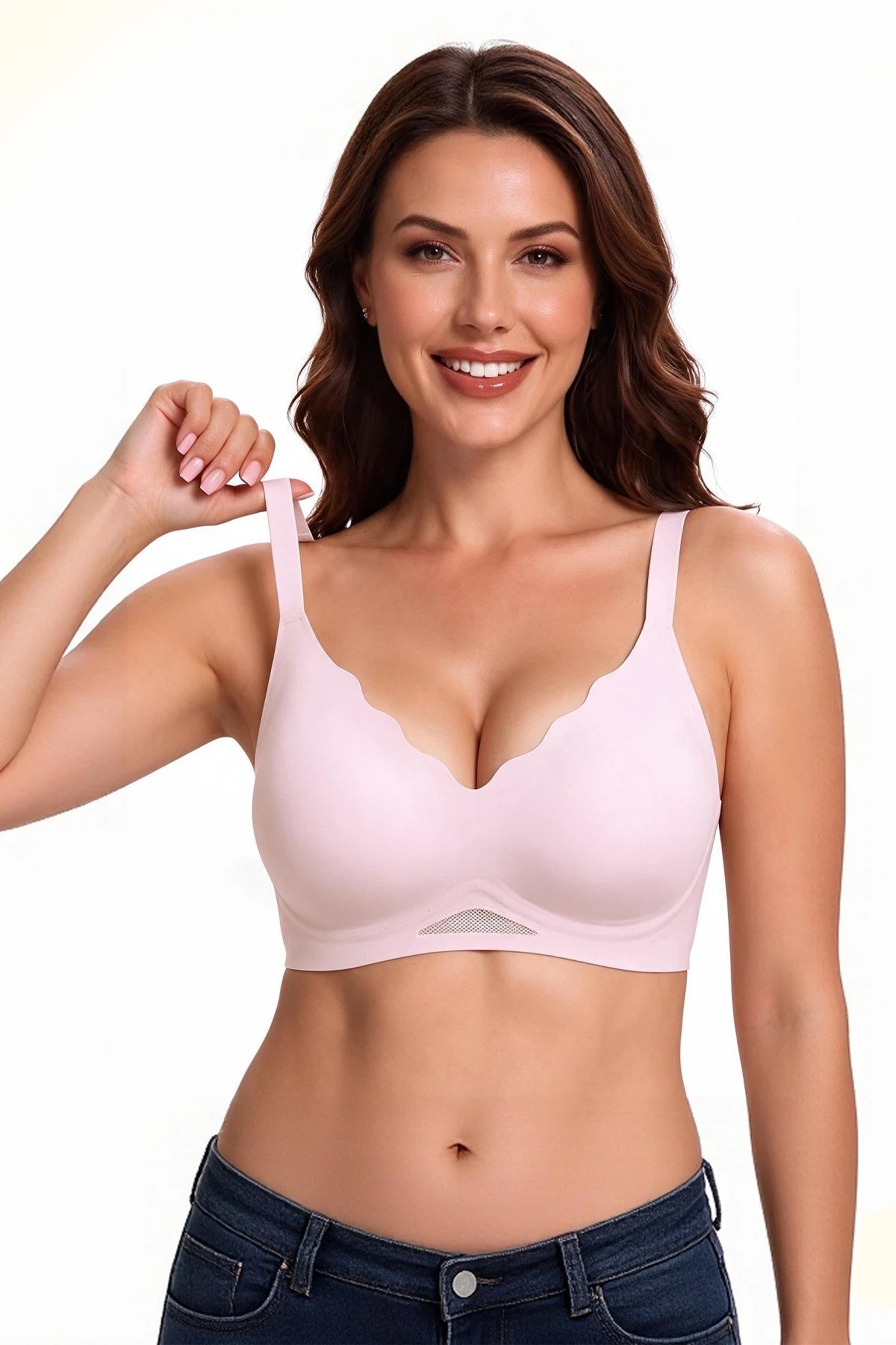 Pink seamless bra with scalloped neckline, molded cups, and wide straps