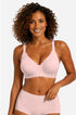 Pink no-underwire full-coverage bra with scalloped trim and supportive wide straps