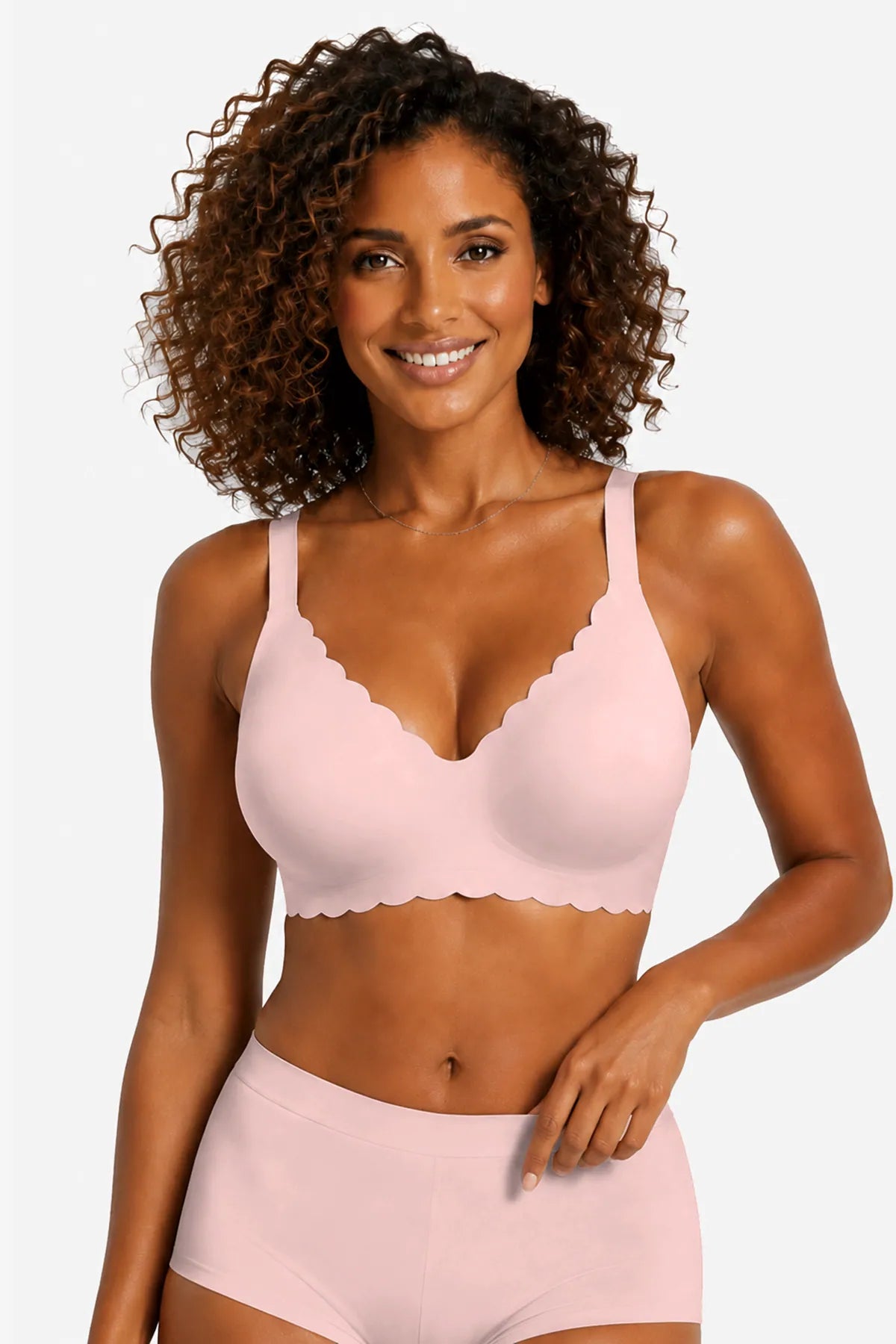 Pink no-underwire full-coverage bra with scalloped trim and supportive wide straps