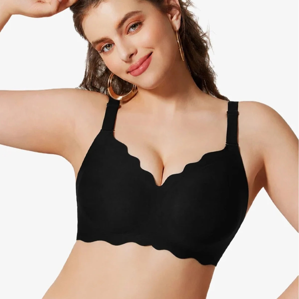 Black seamless wireless bra with scalloped edges and wide adjustable straps