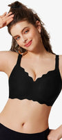 Black seamless wireless bra with scalloped edges and wide adjustable straps