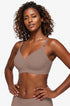 Seamless grey plunge push-up bra with thin adjustable straps and wireless cups