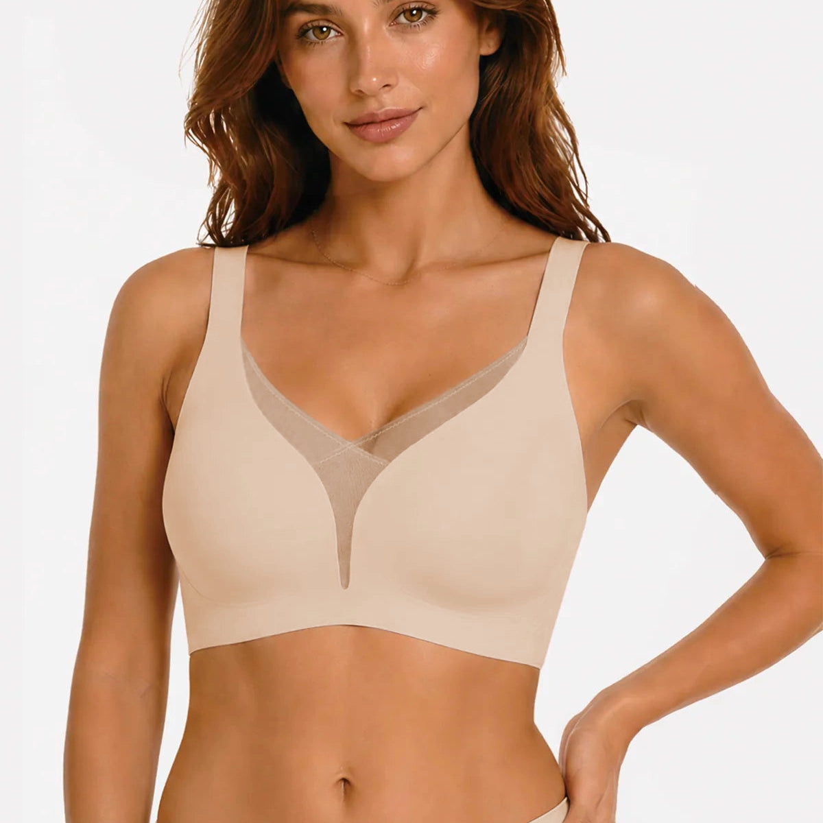 Skin-tone wireless deep V bra with wide straps, smooth cups, and matching high-waisted briefs.