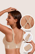 Nude wireless cross-back T-shirt bra with adjustable straps, full coverage cups