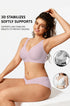 Pink deep V wireless bra with soft stabilizing support, model seated