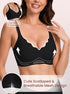 Black wireless bra with scalloped neckline, mesh panel, and full side coverage