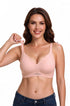 Pale pink wireless bra with scalloped neckline and wide straps, worn from the front