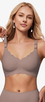 Grey seamless push-up bra with scalloped underbust edge and adjustable straps