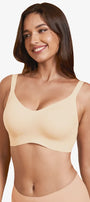 Nude wireless full-coverage t-shirt bra with wide straps, smooth seamless cups