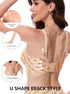 Beige wireless bra with U-back cross straps and all-over script print.
