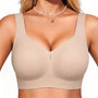 Nude seamless full-coverage bralette with wide, scoop neckline straps, no underwire.